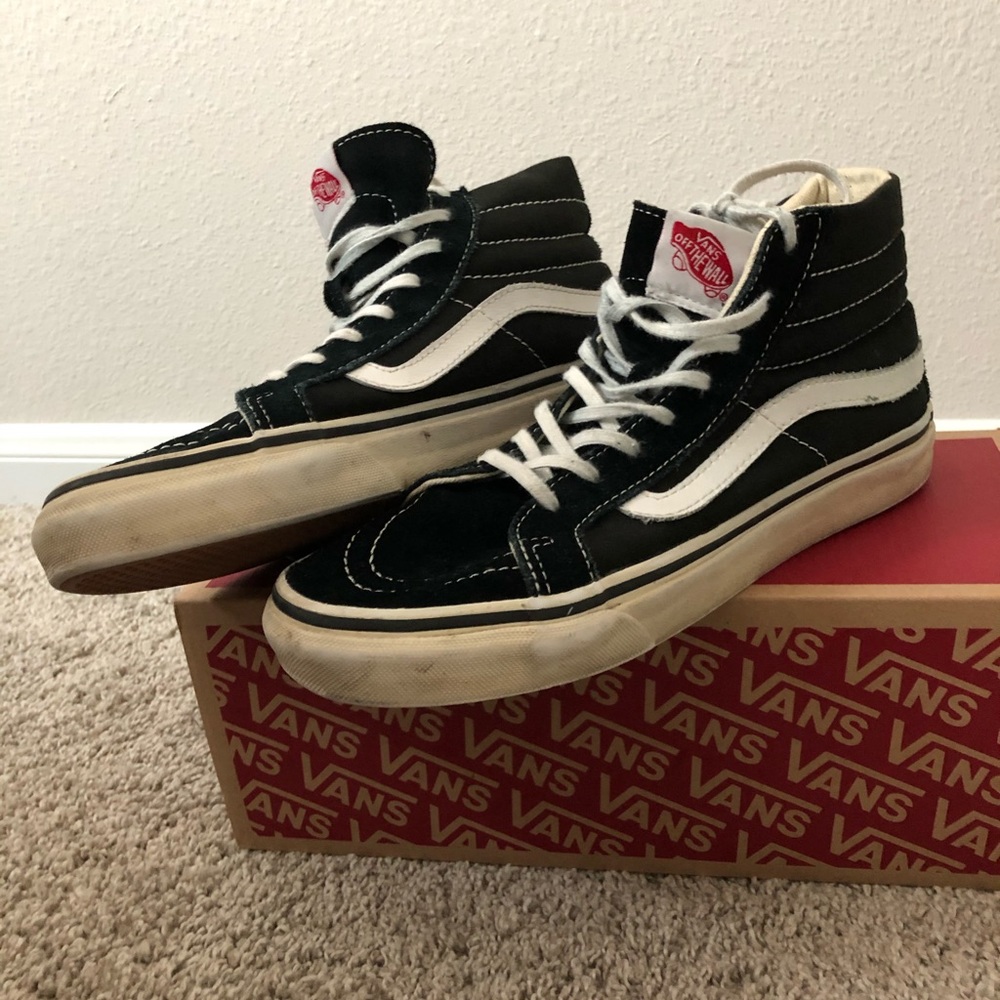 Black and white hi-top vans
